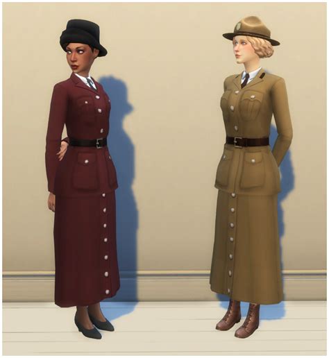 Two Women In Dress And Hats Standing Next To Each Other