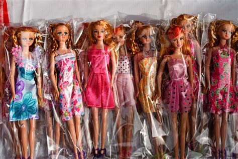 fake barbie dolls for sale at the market thaths flickr