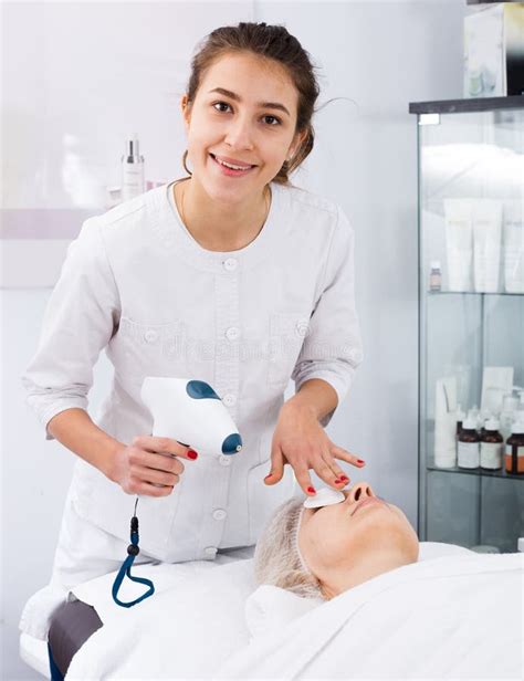 Aged Woman Making Beauty Procedures For Face In Spa Salon Stock Image Image Of Responsible