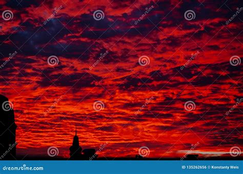 Red Bloody Sunset In Cloudy Sky Above The Village Beautiful
