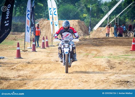 Shot of Off Road Dirt Bike Rider Navigating Rough Track and Then