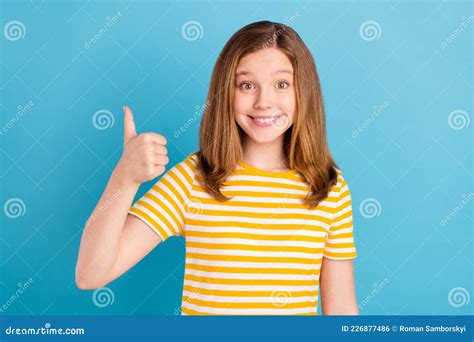 Photo Of Candid Cheerful Person Toothy Smile Show Thumb Up Look Camera On Blue Color Background