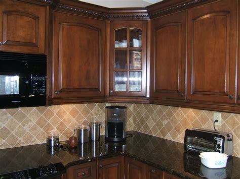 You can choose between black marble, granite, quartzite, and soapstone, among others. light colored oak cabinets with granite countertop | Here are my dark cherry cabinets, with ...