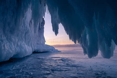 Ice Cave In Baikal Lake In Winter Season At Sunset Russia Siberia