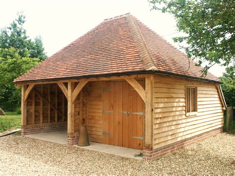 How to calculate ridge beam size. Oak framed garage with hipped tiled roof | Timber garage ...