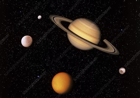 Composite Image Of Saturn And Four Of Its Moons Stock Image R390