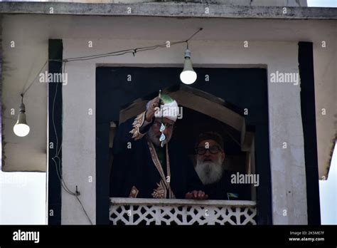A Head Priest Of The Hazratbal Shrine Displays The Holy Relic Believed