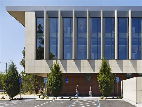 Precast Concrete Fins Help To Shade The Glass Office Wall From Direct