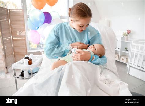 Young Mother With Newborn Baby In Maternity Hospital Stock Photo Alamy