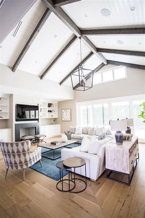 Transitional Living Room Boasts Vaulted Ceilings With Wood