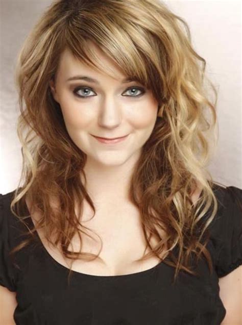 The bangs are worn long and swept to one side, framing the face in charming layers. Curly Hair With Side Bangs Hairstyles Hairstyles For Long ...
