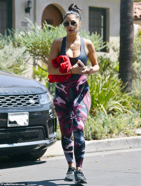 Nicole Scherzinger Shows Off Her Cleavage In A Low Cut Tank Top