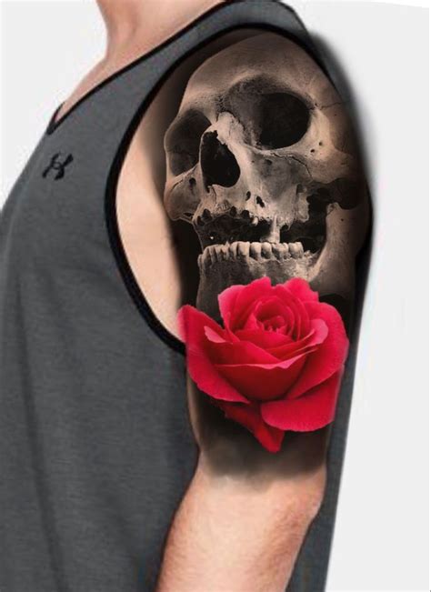 A Man With A Skull And Rose Tattoo On His Arm