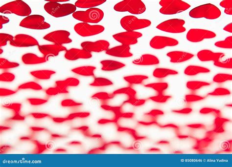 Valentines Day Pattern Of Red Hearts Confetti With Blur On White