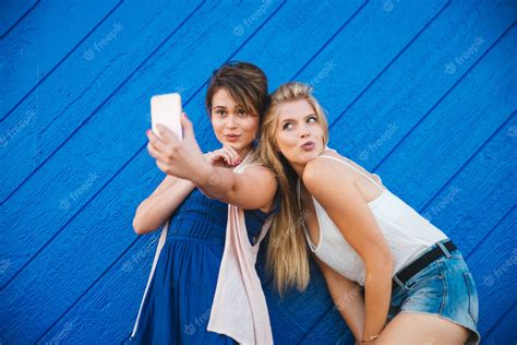 Premium Photo Two Girls Taking Selfie