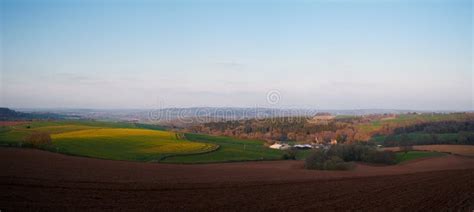 Panoramic View Of Rolling English Countryside With Blue Sky And Green