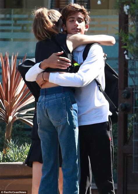 Kaia Gerber Dons Retro Crop Top And Patched Jeans To Lunch Daily Mail