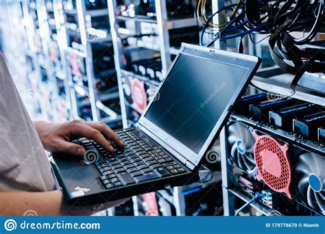 The best prebuilt bitcoin mining rig. IT Specialist Working On Computer In Bitcoin And Crypto Currency Mining Farm Stock Photo - Image ...
