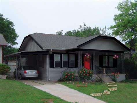 Slinky black trim contrasts against the cool white brick exterior of this contemporary home. And Kathleen | Liz's First Home!