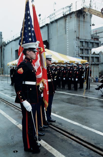 A Marine Corps Color Guard Stands At Attention During The Commissioning