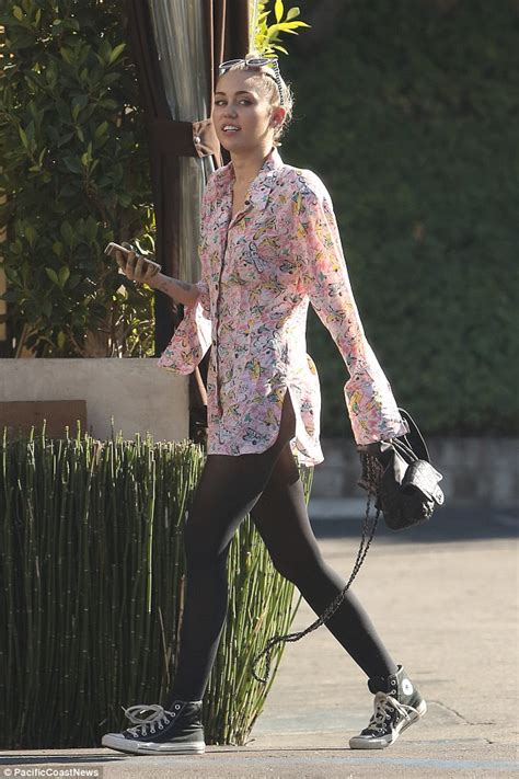 Miley Cyrus Steps Out In Just A Shirt And Sheer Stockings In California Daily Mail Online