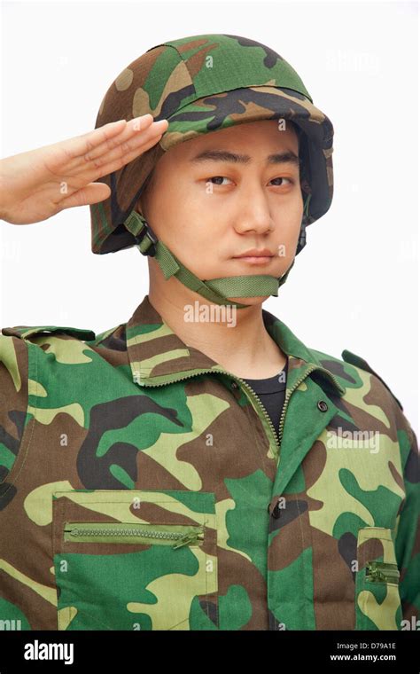 Portrait Of Man In Military Uniform Saluting Stock Photo Alamy