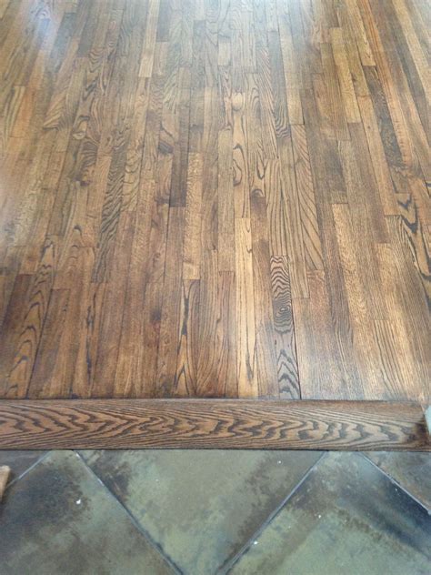 Unique carpet to tile threshold. Custom stained hardwood floor and threshold meeting tiled ...