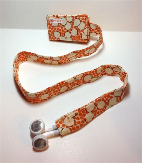 40+ free zipper pouch tutorials & patterns. TuneTube. iPhone or iPod headphone earbud cord organizer. | Etsy | Ipod headphones, Earbud ...