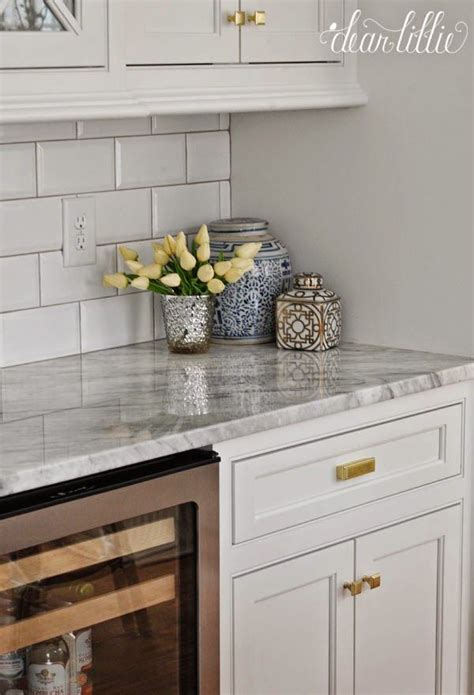 Rejuvenation is a classic american lighting and house parts general store for home improvement whose mission is to add real value to homes, buildings, and projects. A Classic and Timeless White Kitchen by Dear Lillie I really like these countertops. w/ some ...