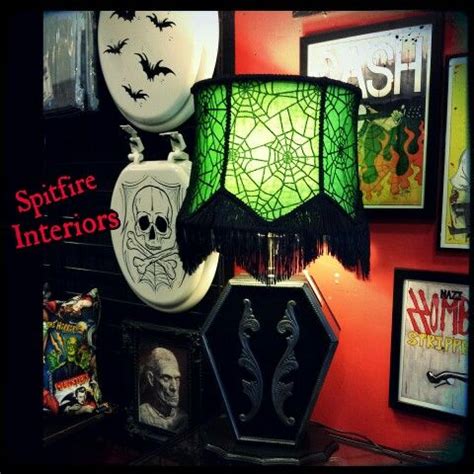 Who says decorating means spending all your life savings and then some? Coffin Lamp with Green Spiderweb shade. Available at ...