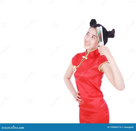 Woman Wearing Chinese Cheongsam Dress And Holding A Chinese Fan Stock