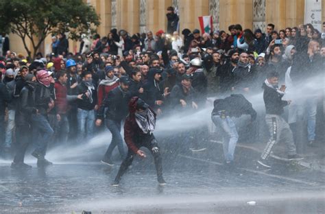 Lebanon Police Fire Tear Gas At Protesters Amid Beirut Riots PBS News