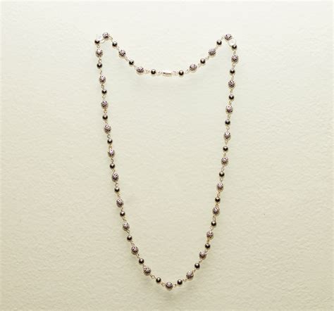 This Necklace Was Made With Eye Pins And Metal Beads And Has An Easy