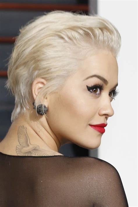 Rita Ora Straight Platinum Blonde Choppy Layers Hairstyle