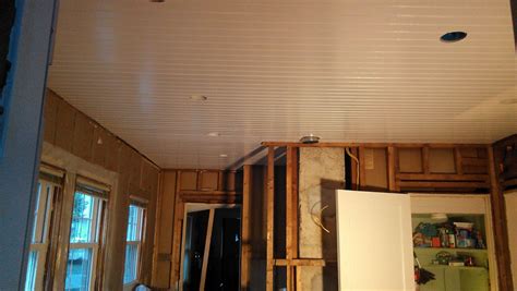 The bead board panels (home depot or other big box store) were applied, then wooden cross beams and finally the crown molding. House to Home: Who wants drywall?! Beadboard ceiling!
