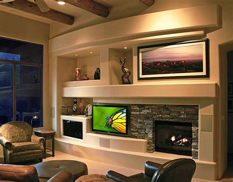 Ideas include an adobe fireplace inlaid with brick, decorative concrete ornamented with hand concrete retaining walls like the unilock rivercrest wall are a great choice as they mimic the look and feel design a pleasant focal point with cultured stone veneer and sandstone capping, and surround. Great room soffit ideas | Home entertainment centers, Home ...