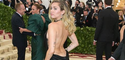 Miley Cyrus Stuns With Breast Shaking Video In Honor Of Dolly Parton S