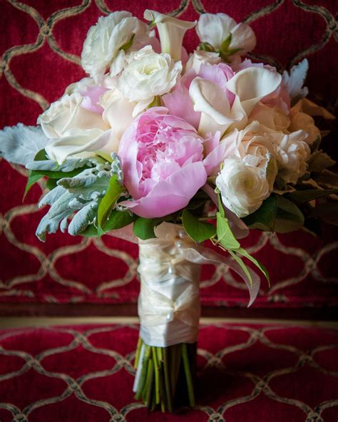 Bouquet With Peonies Wrapped In Ribbons And Pearl Pins Weddings