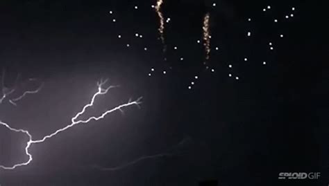Find gifs with the latest and newest hashtags! Spectacular Lightning Strike Hits While Fireworks Explode ...