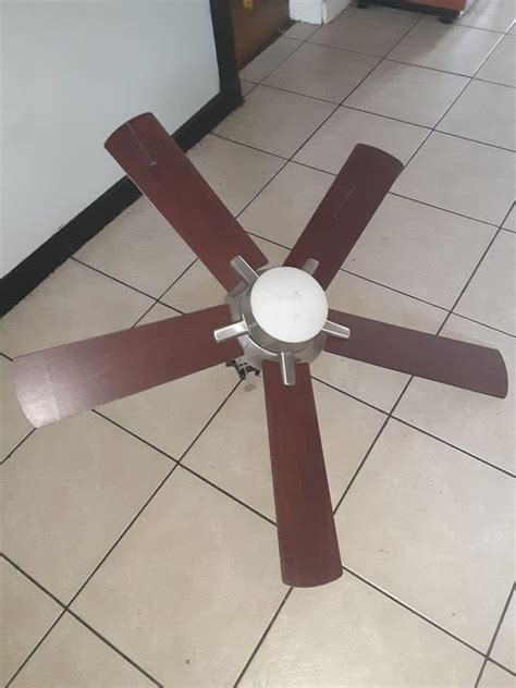 A distinctive style that's sure to capture attention. Ceiling fan for Sale in Tampa, FL - OfferUp
