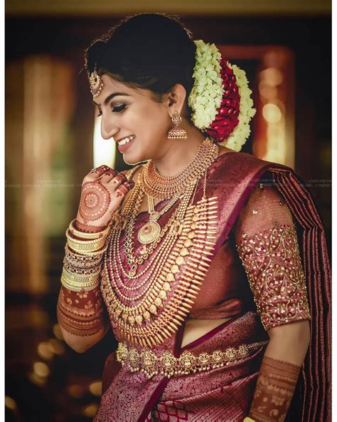 Image May Contain One Or More People And Closeup South Indian Wedding Saree Bridal Hairstyle