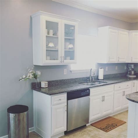 These timeless, elegant, classic colors guarantee beautiful, usable color all the time, every time. Newly refinished white kitchen cabinets in Benjamin Moore ...