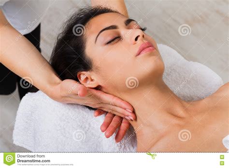 Woman Beautician Doctor Make Neck Massage In Spa Wellness Center Stock