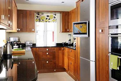 In a small kitchen you need to think creatively when it comes to storage. Small Kitchen Designs Ideas Pictures & DIY Remodel Tips