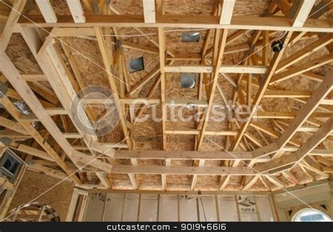 You can do it and do it right, here is some helpful info for any diyer tackling a truss modification job.this can help anyone trying to add a higher ceiling. Framing a Double Tray Ceiling 1 stock photo