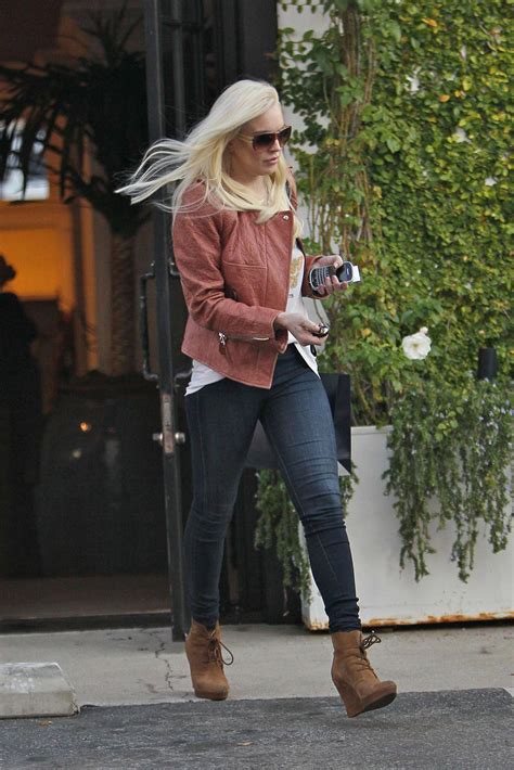 The center part blonde hair style is charming. Lindsay Lohan Leaving The Ralph Lauren Store in Los ...