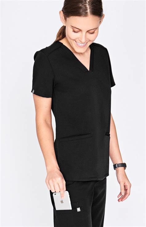 With Stretch Fabric And Three Pockets The Women S Casma Scrub Top Is Ready For Busy Days Part