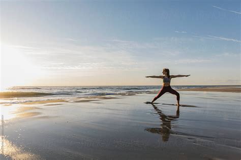 Stockphoto Of Female Athlete Stretching And Doing Yoga On Beach Athletic Photography Photoshoot