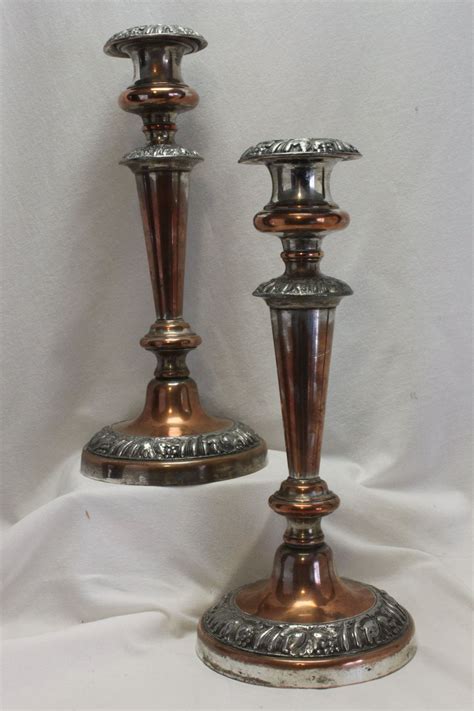 A Lovely Pair Of Old Sheffield Plate Candlesticks Dating From Around