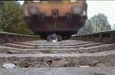Youtube Video Of Maniac Clinging To Railway Tracks As Train Runs Over